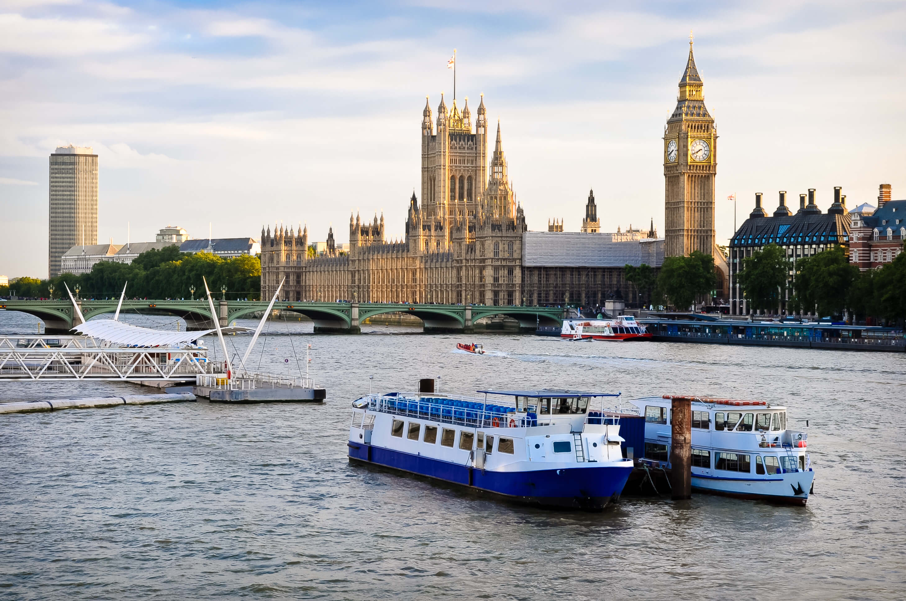 Houses Of Parliament, with boats in foreground, London, UK.